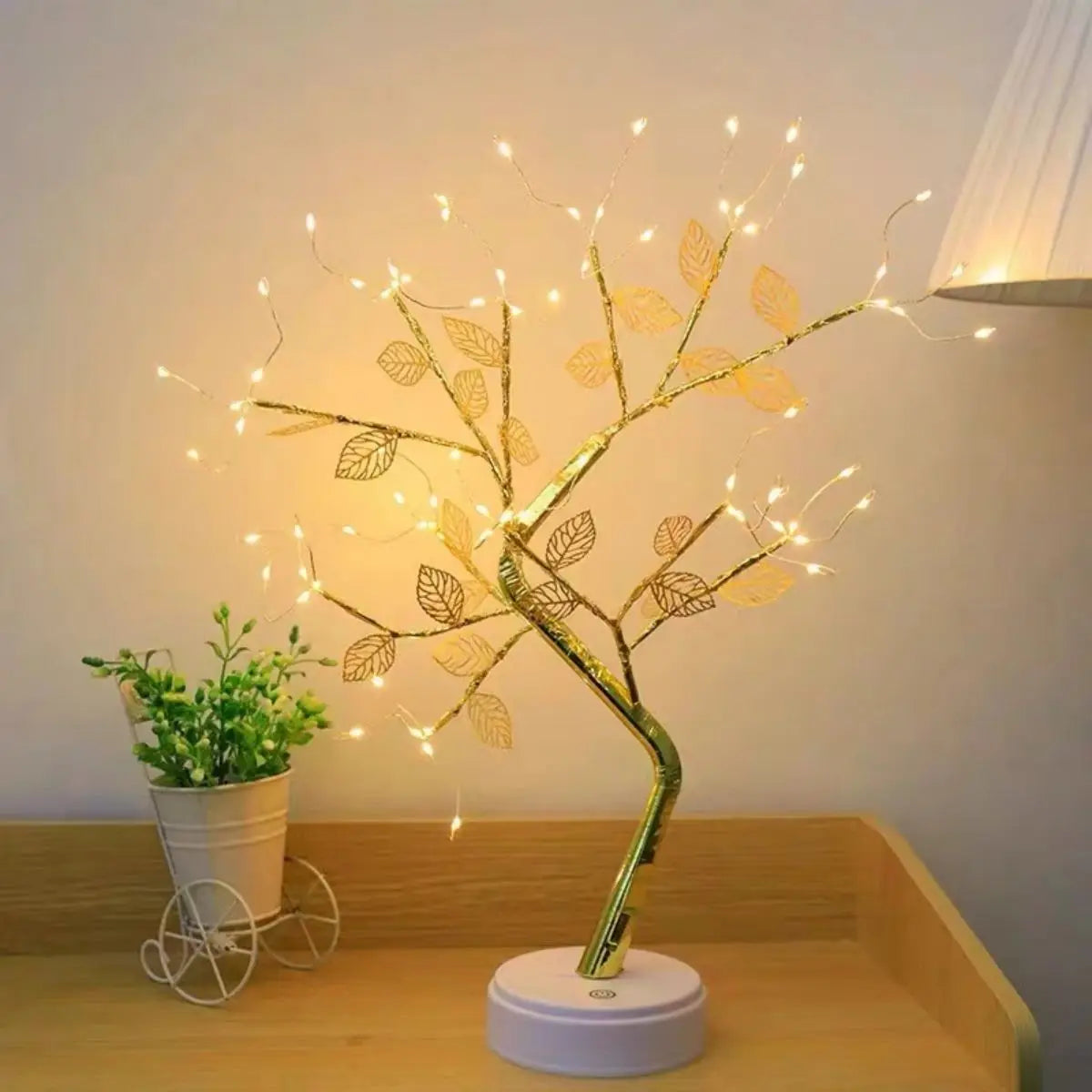 Details: metal foil branches, touch control base and USB cable